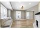 Comfortable living room with a built-in window seat, modern flooring, and natural light, ideal for relaxation at 360 S Spencer Ave, Indianapolis, IN 46219
