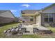 Backyard featuring a patio with grill and mature landscaping at 3677 Cedar Cove Ct, New Palestine, IN 46163