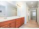 Bright bathroom with double vanity, tub and access to the bedroom from the hallway at 3677 Cedar Cove Ct, New Palestine, IN 46163
