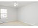Bedroom with neutral carpet, large window and ceiling fan at 3677 Cedar Cove Ct, New Palestine, IN 46163