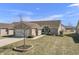 Well-maintained home showcasing a two-car garage, pathway to the front door, and mature landscaping at 3677 Cedar Cove Ct, New Palestine, IN 46163