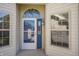 Welcoming entryway featuring a decorative door with sidelights and a covered porch area with a lantern at 3677 Cedar Cove Ct, New Palestine, IN 46163