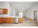 Open concept kitchen offers ample counter space and seamless flow to the living area at 3677 Cedar Cove Ct, New Palestine, IN 46163