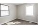 Cozy bedroom featuring a window, neutral walls, and carpeted floor at 3732 Wellington Ave, Indianapolis, IN 46226
