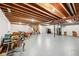 Large unfinished basement with visible beams and mechanicals, offering potential for various uses and customization at 4215 Heyward Pl, Indianapolis, IN 46250