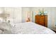 This bedroom has white trim and large double-door closet at 4215 Heyward Pl, Indianapolis, IN 46250