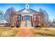 Stately brick clubhouse with grand entrance, perfect for community gatherings and events at 4215 Heyward Pl, Indianapolis, IN 46250