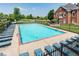 Large outdoor pool surrounded by lounge chairs, ideal for relaxation and summer fun at 4215 Heyward Pl, Indianapolis, IN 46250