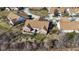 Aerial view of home with brick exterior and backyard at 5115 Baltustrol Dr, Avon, IN 46123