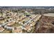 Neighborhood aerial view showcases a community with pond and single-Gathering homes at 5115 Baltustrol Dr, Avon, IN 46123
