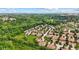 Scenic aerial view of the neighborhood, set amidst a landscape of verdant trees and manicured lawns at 5115 Baltustrol Dr, Avon, IN 46123