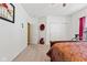 Bedroom with bed, white walls and open door at 5115 Baltustrol Dr, Avon, IN 46123