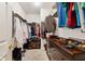 Spacious walk-in closet with custom shelving and ample storage for clothes and accessories at 5115 Baltustrol Dr, Avon, IN 46123
