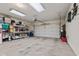 Clean garage with shelving and plenty of storage space at 5115 Baltustrol Dr, Avon, IN 46123