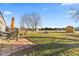 Spacious backyard with a patio and fire pit at 5195 N Frontage Rd, Fairland, IN 46126