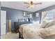 Well-lit bedroom with light walls, carpet, and dresser at 5195 N Frontage Rd, Fairland, IN 46126