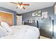 Well-lit bedroom with light walls, carpet, and dresser at 5195 N Frontage Rd, Fairland, IN 46126