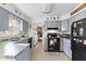 Practical kitchen with grey cabinetry, an island, and stainless steel appliances at 5195 N Frontage Rd, Fairland, IN 46126