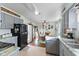 Open kitchen area offering a view of the dining room and neutral countertops at 5195 N Frontage Rd, Fairland, IN 46126