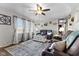 Inviting living room showcasing reclining sofas, a large window, and stylish decor at 5195 N Frontage Rd, Fairland, IN 46126