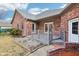 Brick home featuring a backyard deck with a combination brick and wooden surface at 520 Denny Dr, Mooresville, IN 46158