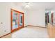 Dining area featuring tile flooring, sliding glass doors to outside, and wood trim at 520 Denny Dr, Mooresville, IN 46158