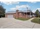 This attractive home boasts a convenient two-car garage, a sprawling driveway, and a lovely, covered porch at 520 Denny Dr, Mooresville, IN 46158