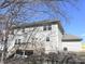 Backyard showcasing a spacious layout, multi-level deck, and mature trees at 632 Middleham Cir, Beech Grove, IN 46107