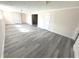 Inviting basement featuring modern floors, creating a versatile living area at 632 Middleham Cir, Beech Grove, IN 46107