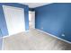 Comfortable bedroom featuring soft carpeting and a spacious closet at 632 Middleham Cir, Beech Grove, IN 46107