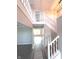 Inviting foyer with beautiful staircase at 632 Middleham Cir, Beech Grove, IN 46107