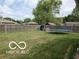Spacious, fenced backyard offering plenty of room for recreation at 6721 Jackson St, Anderson, IN 46013