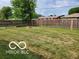 Lush green backyard, perfect for Gathering gatherings and outdoor enjoyment at 6721 Jackson St, Anderson, IN 46013