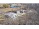 Expansive property with a large home, pond, outbuildings and mature trees at 7143 W 50 S, Morgantown, IN 46160