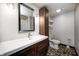 Stylish bathroom featuring modern fixtures, a spacious vanity, and unique pebble flooring for a contemporary design at 7143 W 50 S, Morgantown, IN 46160