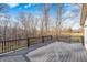 Enjoy scenic views from this large, elevated deck, offering a perfect blend of relaxation and nature at 7143 W 50 S, Morgantown, IN 46160