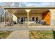 Inviting front porch with comfortable seating and outdoor decor, creating a welcoming entrance to the home at 7143 W 50 S, Morgantown, IN 46160