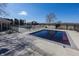 Backyard pool area with an in-ground pool with black frame and an adjacent pool at 7195 Koldyke Dr, Fishers, IN 46038