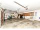 Spacious garage with an automatic door and ample space for storage and vehicles at 7645 Ballinshire N, Indianapolis, IN 46254