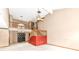 Large living room with open floor plan, staircase, and front entryway at 7645 Ballinshire N, Indianapolis, IN 46254