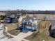 A charming two-story home nestled in a suburban neighborhood, featuring a two-car garage at 7675 Winding Lake S Dr, Noblesville, IN 46062