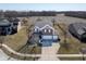 Expansive aerial view of the two-story home showing the large yard and neighborhood at 7675 Winding Lake S Dr, Noblesville, IN 46062