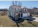 Charming two-story home featuring a brick and vinyl facade and a two-car garage at 7675 Winding Lake S Dr, Noblesville, IN 46062