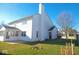 The back exterior features a door, a sunroom with windows, and a partially visible backyard at 777 West St, Whiteland, IN 46184