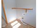 Laundry room showing laundry hook-ups and a storage shelf at 777 West St, Whiteland, IN 46184