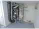 Basement utility room featuring a furnace, water heater and updated plumbing at 777 West St, Whiteland, IN 46184