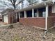 Exterior angle of a brick home with an entry porch and an attached garage at 8328 S Franklin Rd, Indianapolis, IN 46259