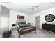 Bedroom with wooden bed frame, contemporary decor, and soft natural light for a relaxing atmosphere at 936 Plunkett Ave, Westfield, IN 46074