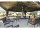 Spacious deck with a gazebo, providing ample seating and a relaxing outdoor experience with views of the surrounding neighborhood at 936 Plunkett Ave, Westfield, IN 46074