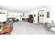 Spacious living room with a corner fireplace and large windows provides plenty of natural light at 936 Plunkett Ave, Westfield, IN 46074